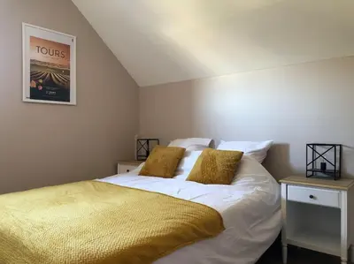 Un ou plusieurs lits dans un hébergement de l'établissement Maison tourangelle au coeur du vignoble Loire Valley