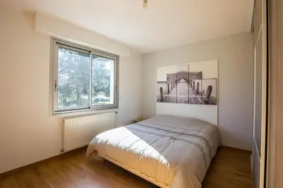 Un ou plusieurs lits dans un hébergement de l'établissement Le Cottage - circuit Bugatti - wifi - 8pers - Rêve au Mans