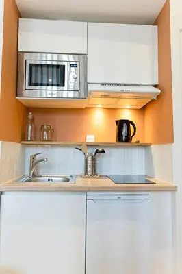 Cuisine ou kitchenette dans l'établissement Le Terracotta - Superbe appartement - Hyper centre