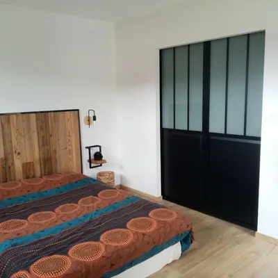 Un ou plusieurs lits dans un hébergement de l'établissement Chambre chez l'habitant Aux portes du Mans Evénements circuits du Mans