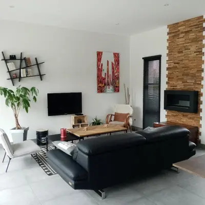 Télévision ou salle de divertissement dans l'établissement Chambre chez l'habitant Aux portes du Mans Evénements circuits du Mans
