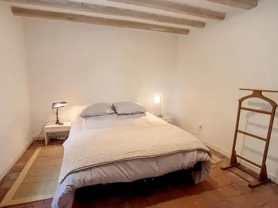 Un ou plusieurs lits dans un hébergement de l'établissement Gîte atypique au cœur du village - Beauval 5 min