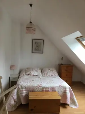 Un ou plusieurs lits dans un hébergement de l'établissement B and B chambres d’hôtes 24 h du Mans et Le Mans Classic