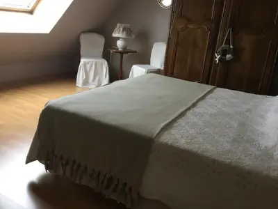 Un ou plusieurs lits dans un hébergement de l'établissement B and B chambres d’hôtes 24 h du Mans et Le Mans Classic