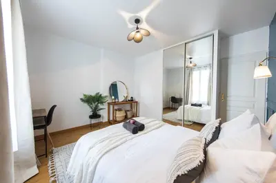 Un ou plusieurs lits dans un hébergement de l'établissement Appartement lumineux 2 chambres Coeur de Tours