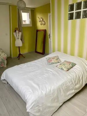 Un ou plusieurs lits dans un hébergement de l'établissement Chambre chez particulier