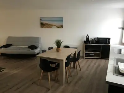 Coin salon dans l'établissement Appartement numéro 4 ou numéro 8