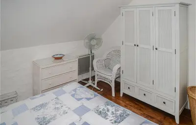 Un ou plusieurs lits dans un hébergement de l'établissement Nice Home In Savigne-Sous-Le-Lude