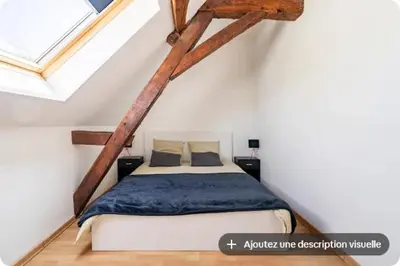 Un ou plusieurs lits dans un hébergement de l'établissement Gîte du Coudray