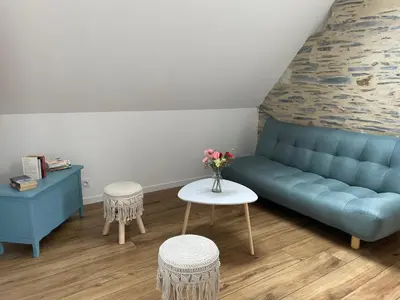 Coin salon dans l'établissement Gite au gré de la Loire piscine et spa