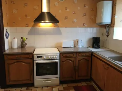 Cuisine ou kitchenette dans l'établissement Gîte R-D-T