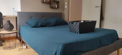 Un ou plusieurs lits dans un hébergement de l'établissement Location chambre au calme proche circuit des 24 heures