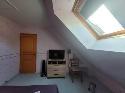 Télévision ou salle de divertissement dans l'établissement Chez Jo