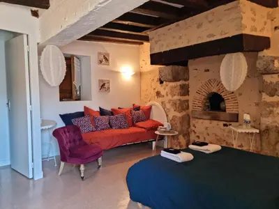 Coin salon dans l'établissement L 'Aupinouse Chambre double Pivoine avec salle d'eau privative