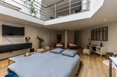 Un ou plusieurs lits dans un hébergement de l'établissement L'Atypique-Le LOFT du Mans