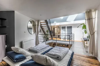 Un ou plusieurs lits dans un hébergement de l'établissement L'Atypique-Le LOFT du Mans
