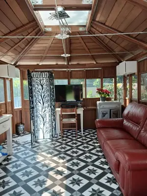 Coin salon dans l'établissement VILLA TARA