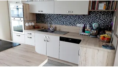 Cuisine ou kitchenette dans l'établissement Maison d'hôtes avec jardin 3 chambres pour 7 à 45 min circuit 24h du Mans