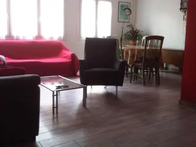 Coin salon dans l'établissement Chambre Olivier