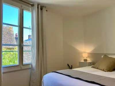 Un ou plusieurs lits dans un hébergement de l'établissement La Petite Maison du 9