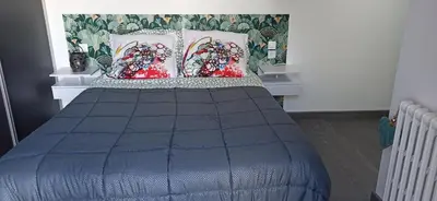 Un ou plusieurs lits dans un hébergement de l'établissement Chambre d'hôtes