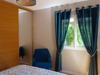 Un ou plusieurs lits dans un hébergement de l'établissement Chambre le Mans