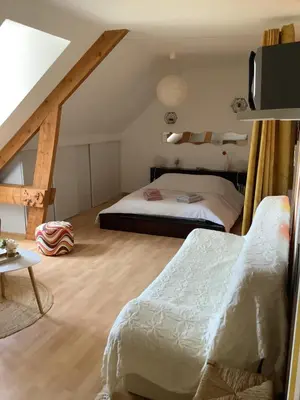 Un ou plusieurs lits dans un hébergement de l'établissement Maison à la campagne