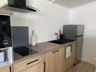 Cuisine ou kitchenette dans l'établissement joli logement indépendant
