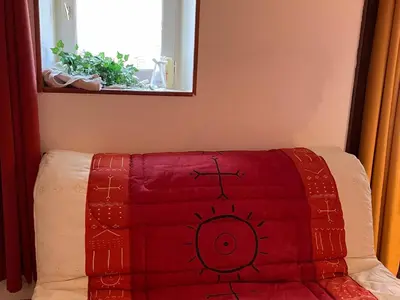Un ou plusieurs lits dans un hébergement de l'établissement Gîte cosy au calme avec grand jardin, proche du Mans - Parking privé, Wifi fibre, équipements complets - FR-1-410-392