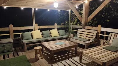 Terrasse ou espace extérieur de l'établissement Maisonnette perchée au cœur de la nature