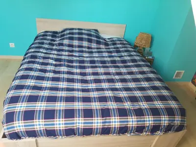 Un ou plusieurs lits dans un hébergement de l'établissement Chambres chez l'habitant