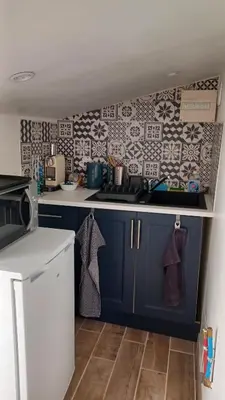 Cuisine ou kitchenette dans l'établissement La Sardinière, Charmante maison dans un jardin