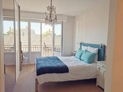 Un ou plusieurs lits dans un hébergement de l'établissement Grand Appartement Familial, Tours Centre, Parking
