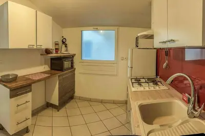 Cuisine ou kitchenette dans l'établissement Le logis des roses